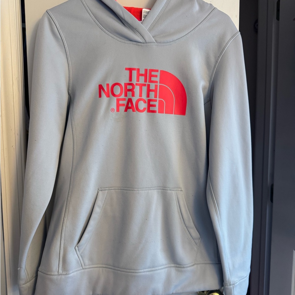 The North Face Light Blue Hoodie with Pink Logo Tag